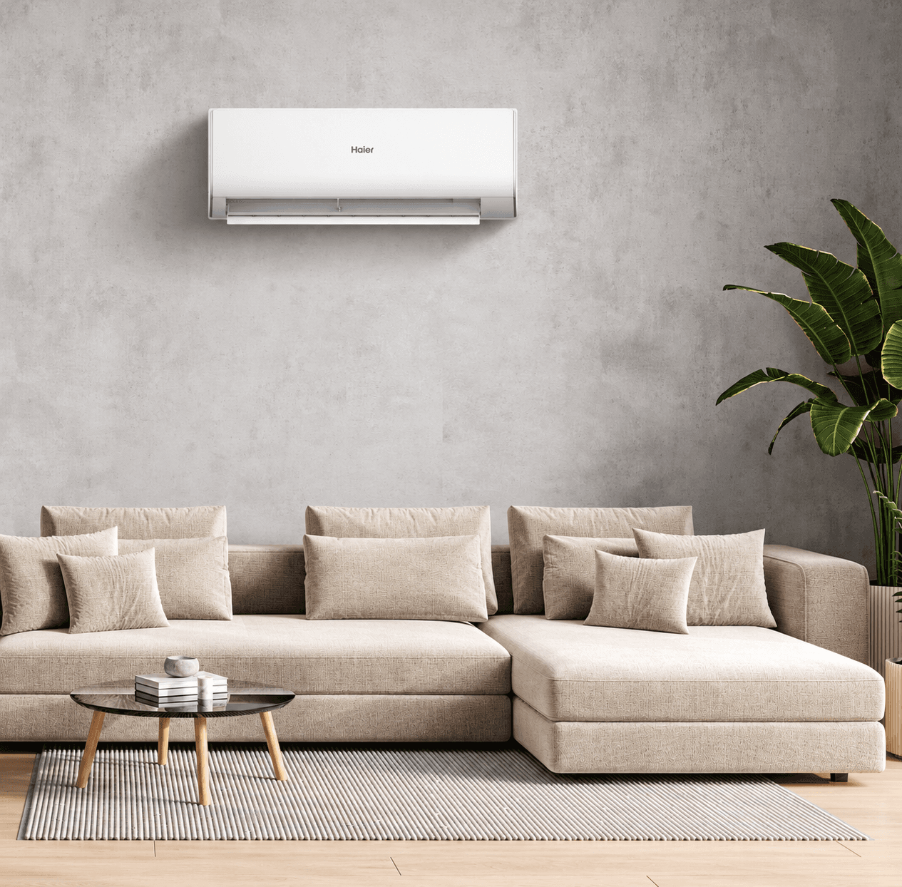 A Haier wall-mounted split air conditioner installed above a sofa in a modern living room